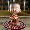Guangshunfa creative car decoration car decoration office decoration car ornaments shaking head small monk car ornaments cartoon car decoration products wish to become