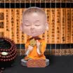 Boliliang car decoration jewelry vibrating car car shaking head small monk car interior decoration car decoration supplies creative cute cartoon gifts laughing mouth often open