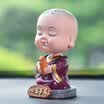 Molong new small monk car accessories car cute cartoon doll creative car ornaments financial resources billowing