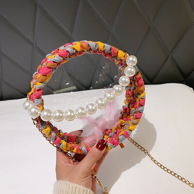 2019 new woven round pearl handbag female chic wild chain cosmetic bag personalized transparent Messenger bag
2019 new woven round pearl handbag female chic wild chain cosmetic bag personalized transparent Messenger bag