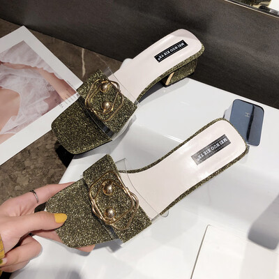 Slippers Women Wear Cold Slippers Outside Summer Women Korean Edition of Rough-heeled Transparent Metal Button Fashion Slippers
Slippers Women Wear Cold Slippers Outside Summer Women Korean Edition of Rough-heeled Transparent Metal Button Fashion Slippers