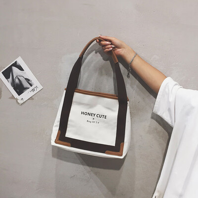 Tote bag female 2019 new Korean casual wild canvas shoulder bag simple large-capacity shopping bag
Tote bag female 2019 new Korean casual wild canvas shoulder bag simple large-capacity shopping bag