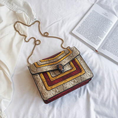 Qiao Bani 2019 new European&American style fashion BV hit color hot snake head flip bag shoulder diagonal trend handbags
Qiao Bani 2019 new European&American style fashion BV hit color hot snake head flip bag shoulder diagonal trend handbags