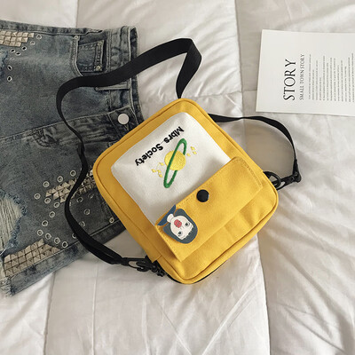 Fashion temperament color crossbody bag chic versatile shoulder bag female 2019 new cartoon cute planet canvas bag
Fashion temperament color crossbody bag chic versatile shoulder bag female 2019 new cartoon cute planet canvas bag