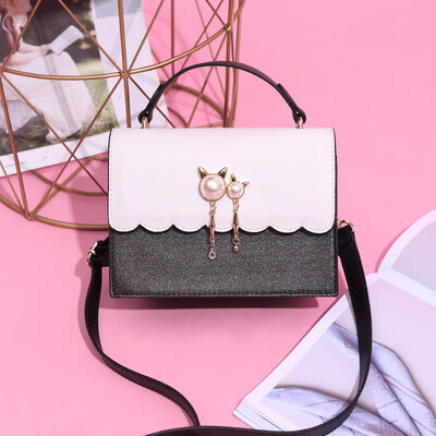 In summer the new small womens handbags are in vogue Korean mini handbags with one shoulder slung over one shoulder are versati
In summer the new small womens handbags are in vogue Korean mini handbags with one shoulder slung over one shoulder are versati