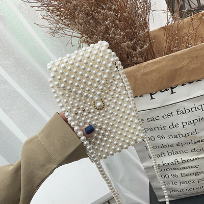 Qiao Bani 2019 new Korean Bohemian fashion handmade pearls hand strap shoulder diagonal trend handbags
Qiao Bani 2019 new Korean Bohemian fashion handmade pearls hand strap shoulder diagonal trend handbags