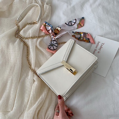Qiao Bani 2019 new European&American style fashion simple solid color silk scarf chain clamshell bag shoulder diagonal tide handbag
Qiao Bani 2019 new European&American style fashion simple solid color silk scarf chain clamshell bag shoulder diagonal tide handbag