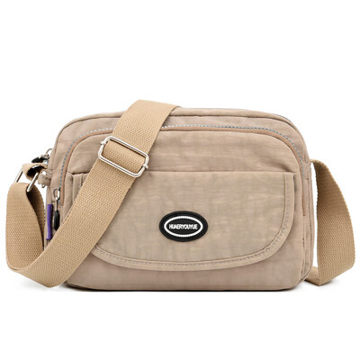 Leisure shoulder bag waterproof slung wallet portable multilayer nylon canvas bag mother bag
Leisure shoulder bag waterproof slung wallet portable multilayer nylon canvas bag mother bag