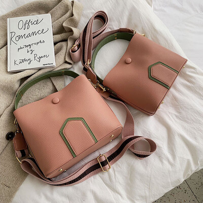 Contrast color small slung bucket bag 2019 new Korean version of Joker simple litchi pattern shoulder bag
Contrast color small slung bucket bag 2019 new Korean version of Joker simple litchi pattern shoulder bag