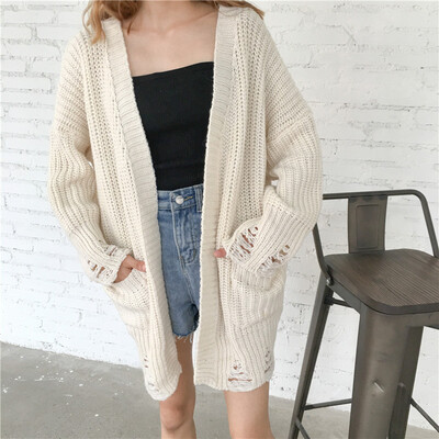 2017 Autumn women's long section thin section sweater hollow tassel hole long-sleeved sweater cardigan sunscreen
2017 Autumn women's long section thin section sweater hollow tassel hole long-sleeved sweater cardigan sunscreen