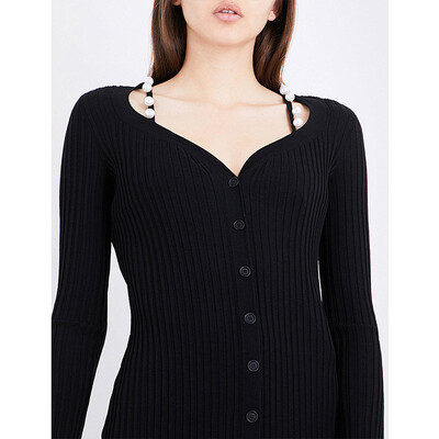 2017 fashion autumn women's wear of the new European and American hearts of pearl buttons with a thin knit dress
2017 fashion autumn women's wear of the new European and American hearts of pearl buttons with a thin knit dress