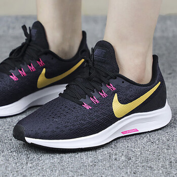 耐克（NIKE）跑步鞋鐵架黑黃勾942855-008 
