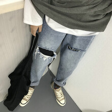 高腰破洞牛仔褲，穿出你的個(gè)性