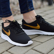耐克（NIKE）跑步鞋812655-004黑色金標 