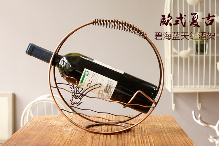 
                                        蒂拉欧式铁艺创意红酒架 古铜色葡萄酒架 创意酒架 酒杯架 酒柜摆件 枫叶款                