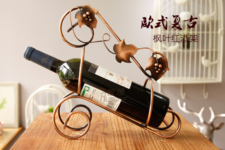 
                                        蒂拉欧式铁艺创意红酒架 古铜色葡萄酒架 创意酒架 酒杯架 酒柜摆件 枫叶款                