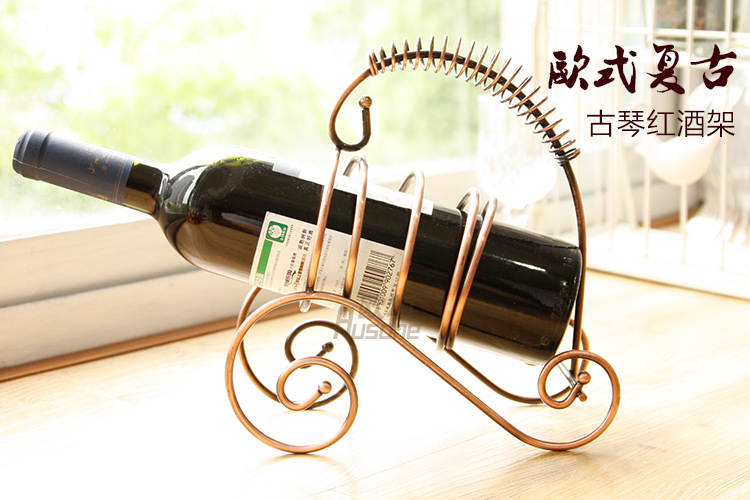 
                                        蒂拉欧式铁艺创意红酒架 古铜色葡萄酒架 创意酒架 酒杯架 酒柜摆件 枫叶款                