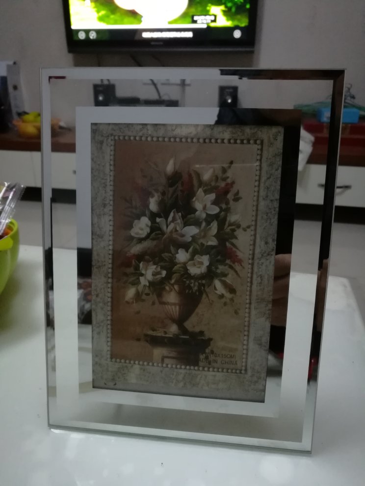 做工精致,预留放相片的地方放上相片刚刚好,放相片摆上好棒棒的。