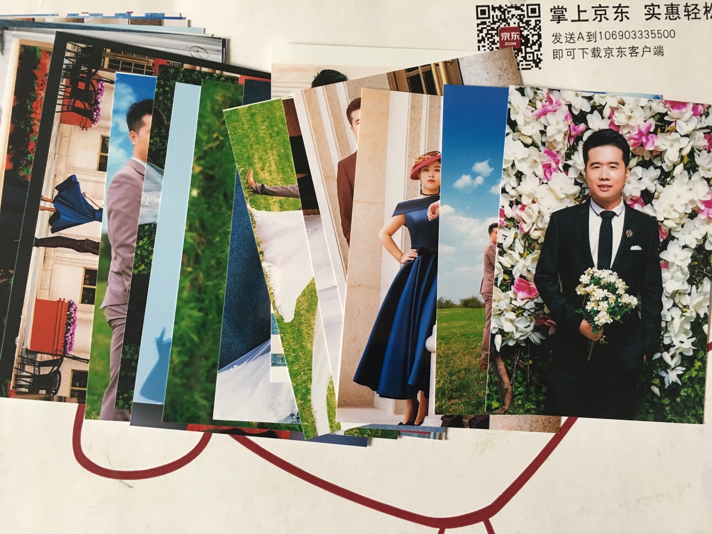 如果是放在相框式的照片墙用的,就不要塑封了,塑封后放不下,还得剪