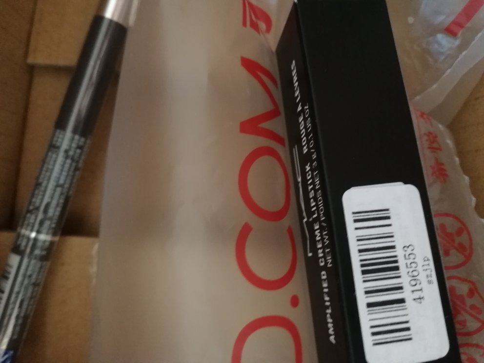 好像要化了,标签外还粘别的标签。。