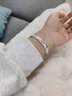 壹遇足銀9999足銀開(kāi)口實(shí)心手鐲女款520節日情人節送女友母親手環(huán)禮物 環(huán)繞編織幸福手鐲 30g 曬單實(shí)拍圖