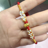 中國黃金（CHINA GOLD）祥瑞蛇年黃金手鏈女足金轉運紅繩手串七夕情人節(jié)禮物送女友生日 足金福字小金蛇桃花手繩【京速達】 曬單實拍圖