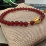 明牌珠寶七夕禮物足金5D硬金黃金生肖小胖兔轉(zhuǎn)運(yùn)珠紅瑪瑙手鏈串珠定價(jià) 亮面款A(yù)FP0629約0.51-0.60克 足金 曬單實(shí)拍圖
