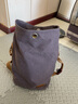 養牛人簡(jiǎn)約日系文藝帆布胸包復古時(shí)尚休閑斜跨水桶包戶(hù)外單肩男士背包 灰色 曬單實(shí)拍圖