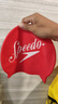 速比濤（Speedo）經(jīng)典復(fù)古logo印花緊致防滑硅膠泳帽 紅色/白色 曬單實(shí)拍圖