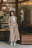 BUOUBUOU奢華兩公里2025春季新品商場同款褶裥雙口袋A擺半裙女 卡其C71 S 曬單實拍圖