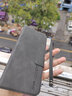 疆科適用OPPO Reno8手機(jī)殼全包翻蓋皮套新款膚感羊巴皮防摔保護(hù)套商務(wù)高檔輕奢便攜式支架可插卡男款 OPPO Reno8【石墨灰】 全包翻蓋式皮套【配掛繩】 曬單實(shí)拍圖
