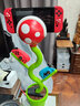 森拓思 任天堂Switch2 NX NS主機桌面霸王花手柄支架可充電投屏放置掛架超級馬里奧底座展示架周邊配件 SWITCH游戲機支架【食人花造型】+替換頭 曬單實(shí)拍圖