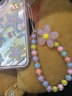 世韓 適用蘋果15手機(jī)殼帶串珠手鏈軟殼小清新女款高級感iPhone15保護(hù)套手腕掛繩保護(hù)套四角防摔 曬單實(shí)拍圖