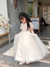 小咔衣濃小女孩公主裙女童花童婚禮蓬蓬紗兒童晚禮服主持人鋼琴演出服大童 白色長(cháng)款 120 曬單實(shí)拍圖