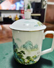 盛天下景德鎮陶瓷帶蓋茶杯釉上彩家用帶手柄男女水杯辦公室會(huì )議杯子粉彩大容量泡茶杯定制 水點(diǎn)桃花-鴻運杯 簡(jiǎn)裝 曬單實(shí)拍圖