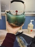 領(lǐng)藝祥鶴觀(guān)海仿鐵壺煮水壺不銹鋼煮茶家用大容量提梁壺燒水壺單壺 祥鶴觀(guān)海304不銹鋼煮水壺(綠) 曬單實(shí)拍圖