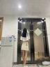 紅蜻蜓半身裙新款2025年夏季女裝毛邊牛仔裙褲高腰a字防走光包臀短裙子 米白色【有內(nèi)襯】 L 曬單實拍圖