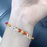 中國黃金（CHINA GOLD）祥瑞蛇年黃金手鏈女足金轉運紅繩手串七夕情人節(jié)禮物送女友生日 足金福字小金蛇桃花手繩【京速達】 曬單實拍圖