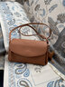巖牛包包女2024新款秋冬斜挎包托特包大容量真皮女包單肩枕頭包 金棕色 曬單實(shí)拍圖