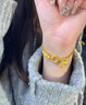 昂隆黃金999小桃花平安扣手鏈女士足金新款鈴鐺轉(zhuǎn)運(yùn)珠滿圈手串送女友 黃金999桃花平安扣手鏈  約8.12克 曬單實(shí)拍圖