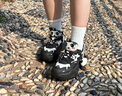 FILA FUSION 斐樂(lè)女鞋新款硬糖厚底休閑老爹鞋貓爪掛件運(yùn)動(dòng)鞋女 黑/奶白-BG 37.5 曬單實(shí)拍圖