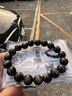 石玥珠寶精品天然金沙黑曜石手串本命年轉(zhuǎn)運(yùn)珠佛珠手鏈男女士款 水晶瑪瑙 10mm金眼黑曜石 曬單實(shí)拍圖