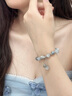 德尼菲洛 DENIFILO水晶手鏈女士新款冰種轉(zhuǎn)運串珠白貓眼石復(fù)古小眾月光石水晶手串 凈手圍14cm 曬單實拍圖