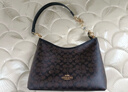 蔻馳（COACH）【品牌直供】女士LAUREL31中號單肩斜挎流浪包深棕配黑色CV975 曬單實(shí)拍圖