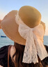 JIOESC遮陽(yáng)草帽女新款大蝴蝶結時(shí)尚氣質(zhì)大帽檐太陽(yáng)帽防曬帽子手工防風(fēng) 【卡其色】大帽檐珍珠蕾絲系繩 曬單實(shí)拍圖