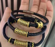 中國(guó)黃金（CHINA GOLD）黃金轉(zhuǎn)運(yùn)珠男款足金饕餮圖騰手鏈刺青手飾手繩生日禮物送男友老公 饕餮轉(zhuǎn)運(yùn)珠手鏈【黑繩-重版】約1.7g 曬單實(shí)拍圖