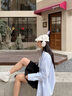 TOMMY JEANS【純棉牛津紡】25春夏女裝學(xué)院風(fēng)寬松落肩挺括襯衫外套20289 淺藍(lán)白條紋色0A7 S 曬單實(shí)拍圖