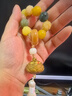 QMXD正宗白玉菩提根手串男多寶蓮花雕刻有錢(qián)花步步生蓮菩提子手鏈女士 手持款 曬單實(shí)拍圖