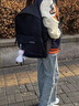回力（Warrior）雙肩包2024新款男士旅行大容量背包女初中高中生男款 黑色【太空人掛件】 曬單實(shí)拍圖