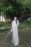 納薇（naivee）春夏季氣質(zhì)垂感修身通勤魚(yú)尾半身裙女優(yōu)雅包臀長(zhǎng)款流光半裙設(shè)計(jì)感 淺灰（及地款） M 曬單實(shí)拍圖